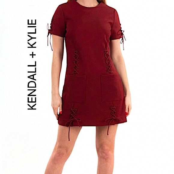 Kendall & Kylie. NWT. Gorgeous mini sheath dress. Tie detail.Brick Red. Medium. - Picture 1 of 13